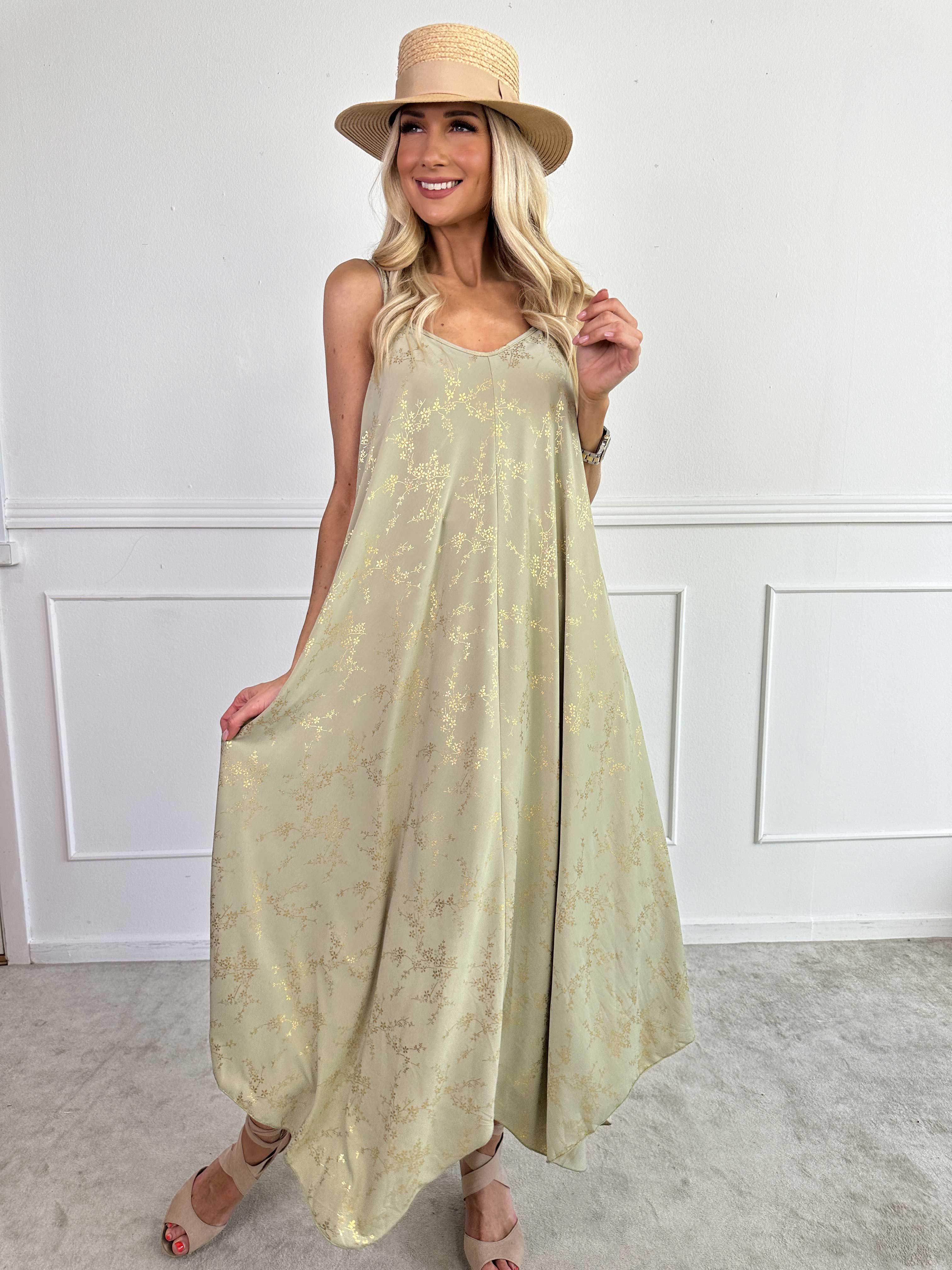 Maisie Gold - Axelremsklänning i elastiskt material med guld mönster